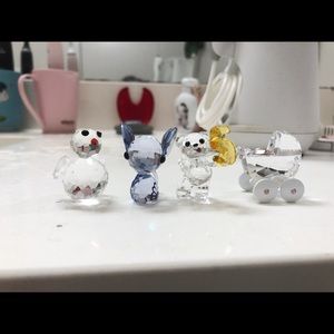 Four Swarovski figures